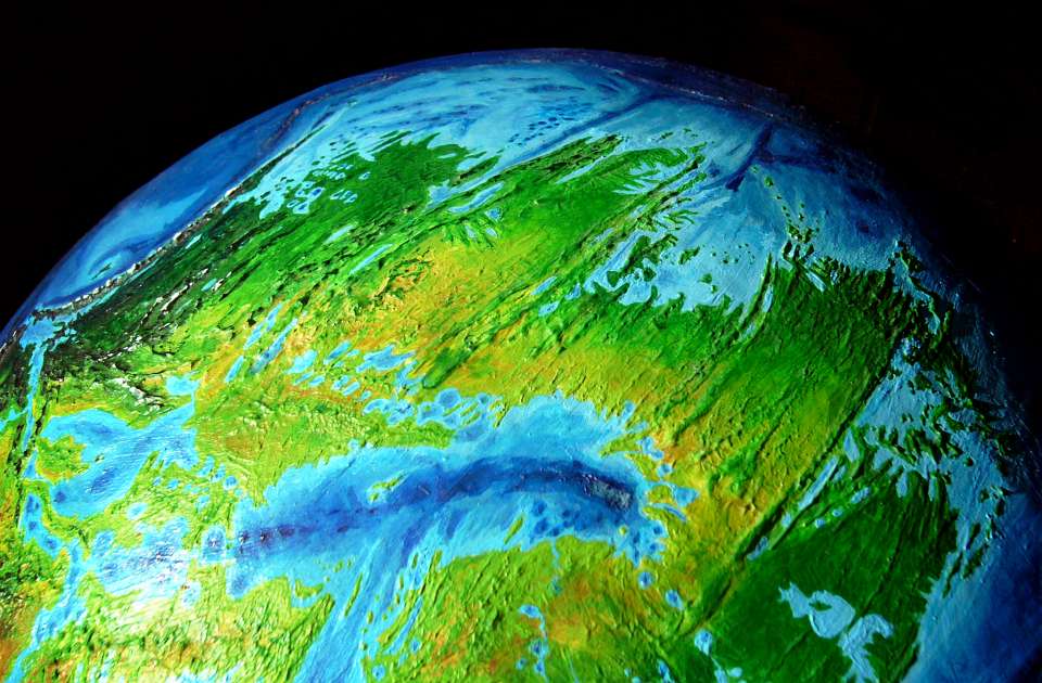 Orbital photo of eastern Pacifica and the Hawaiian Sea on Abyssia, an alternate Earth whose relief has been inverted: heights are depths and vice versa.